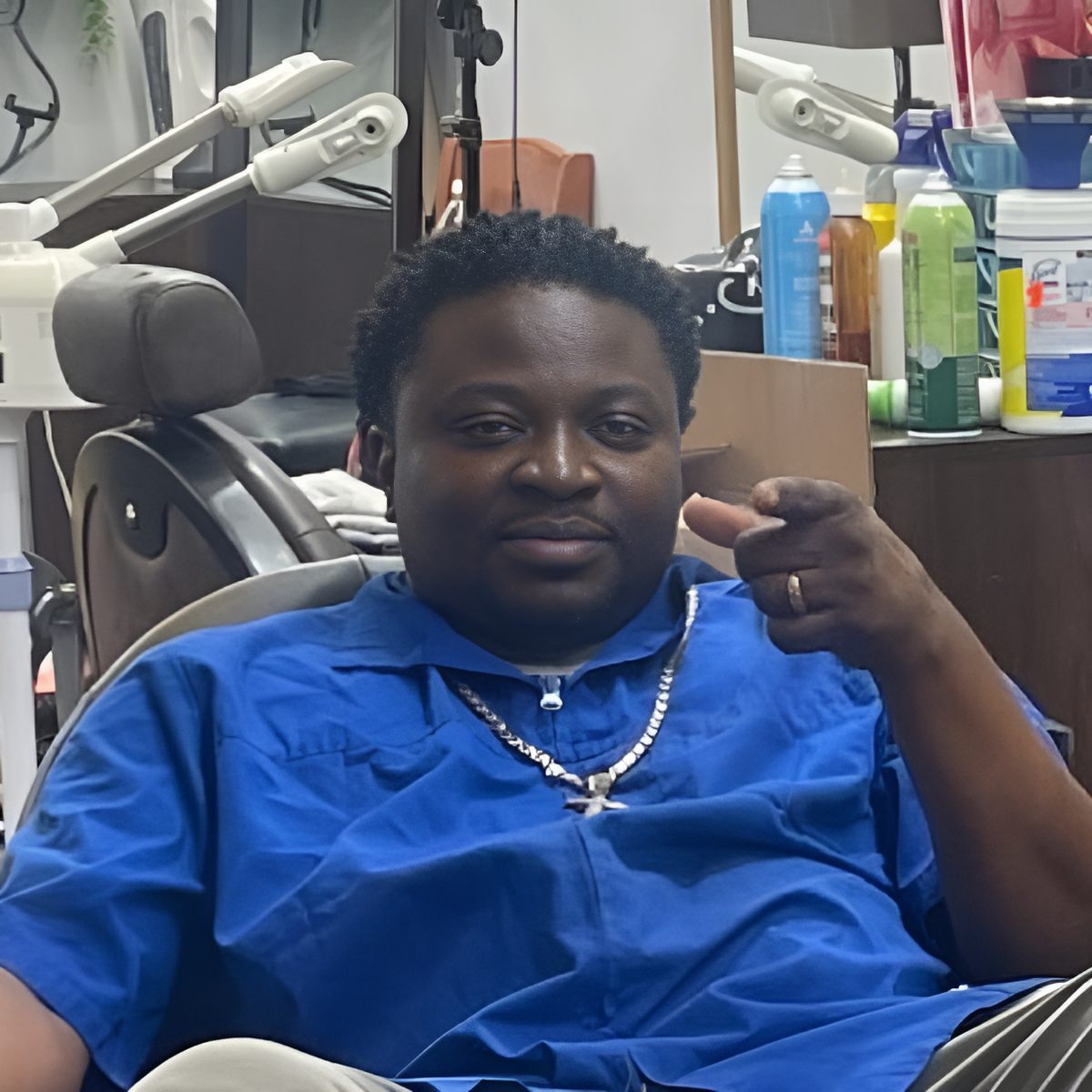 Rico, barber at Ladies & Gents, in his chair